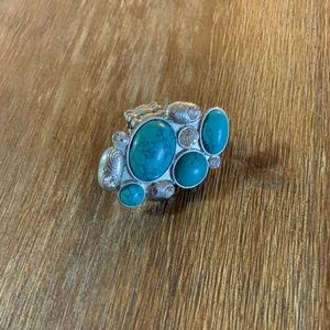 Ring with a stretchy band from the buckle